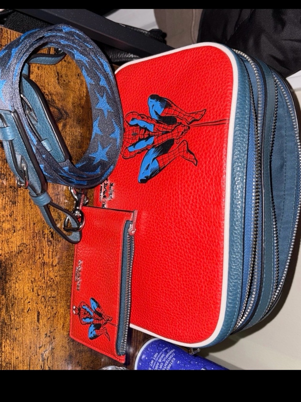 Coach Red Pebbled Leather Crossbody with Blue Trim and Star-Pattern Strap